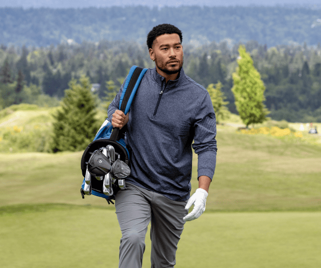 Man wearing cutter and buck polo