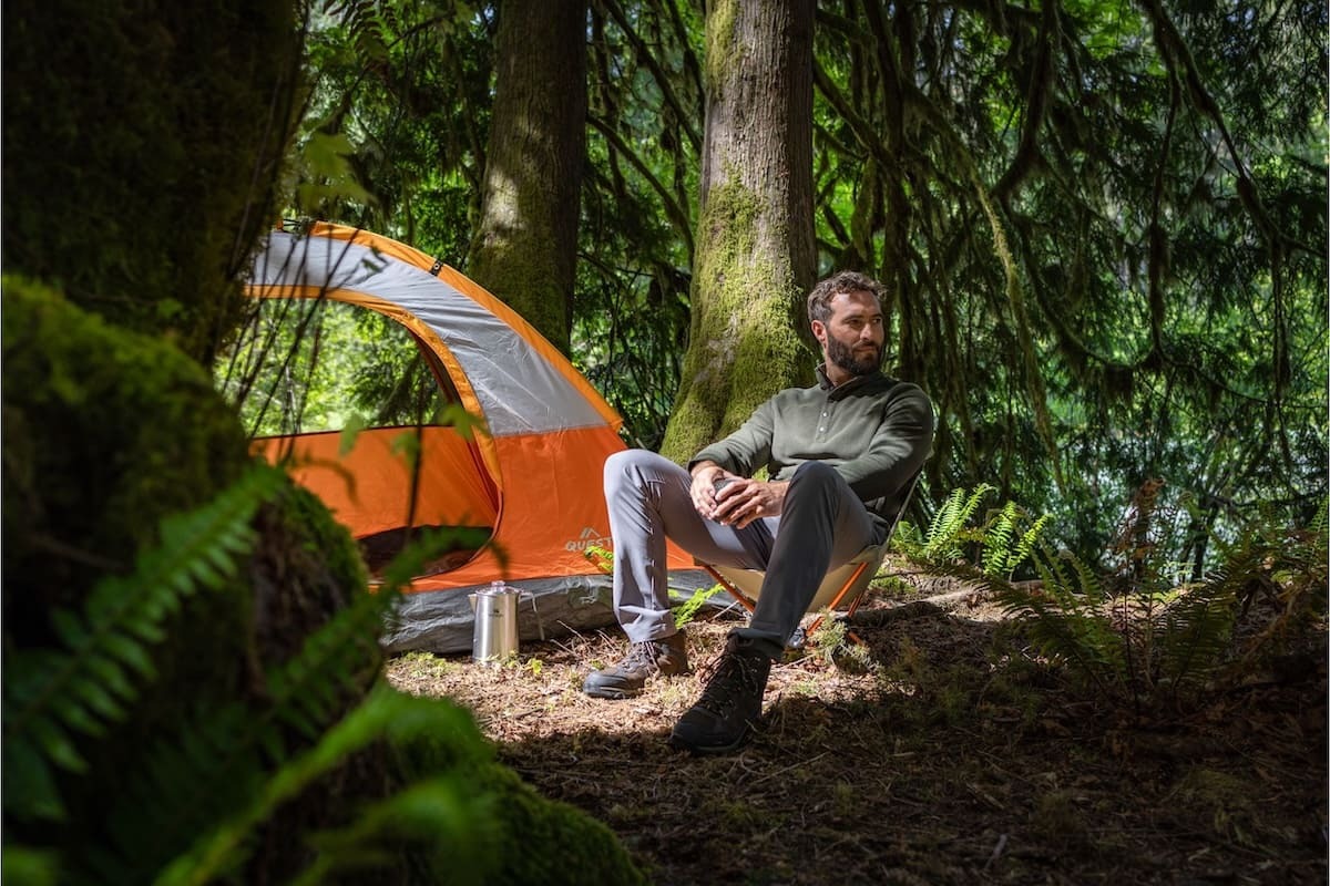 Man sitting at campsite in a Hunts Point Jacquard fleece pullover