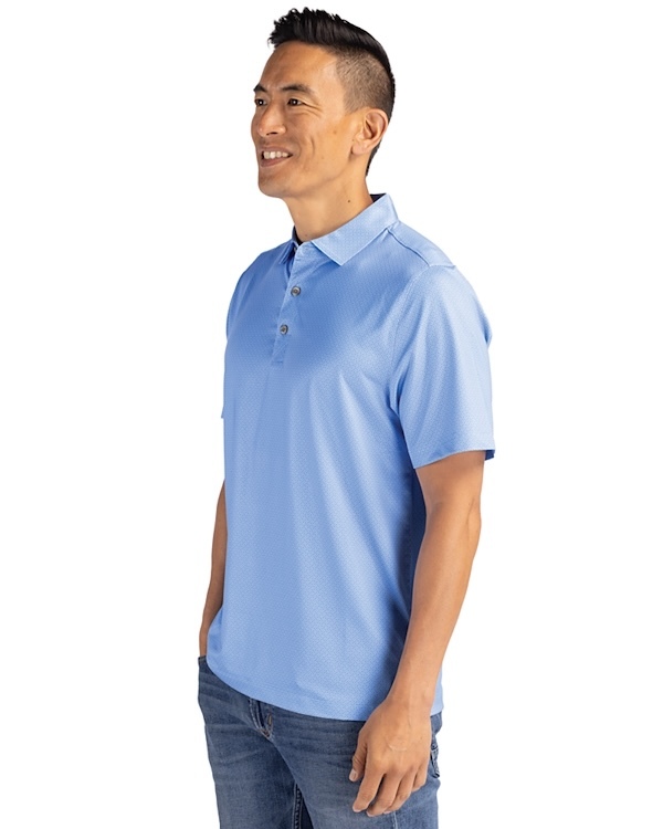 Man wearing Cutter & Buck Pike Eco Tonal Geo Print Stretch Recycled Mens Polo in Atlas